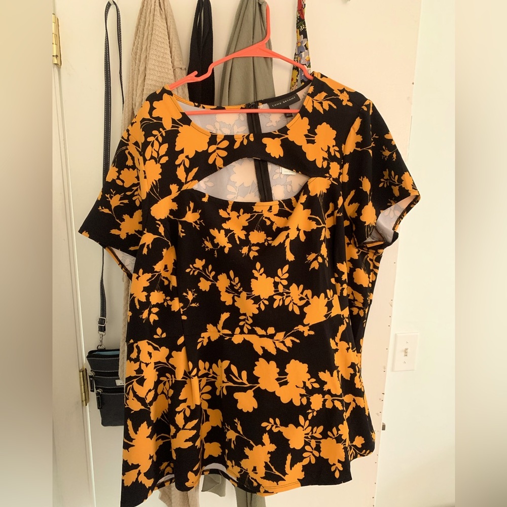 Lane Bryant size 24 golden orange and black peplum, zip back blouse